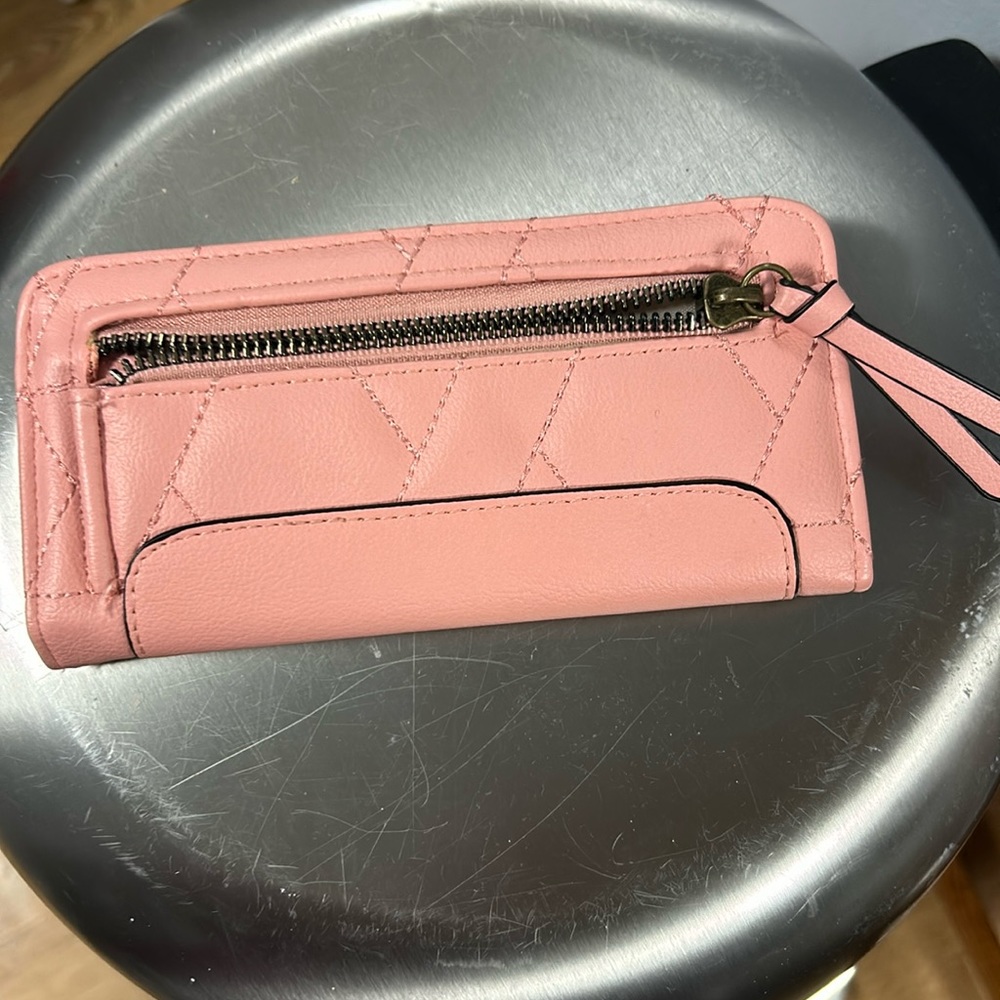 Slightly used pink wallet